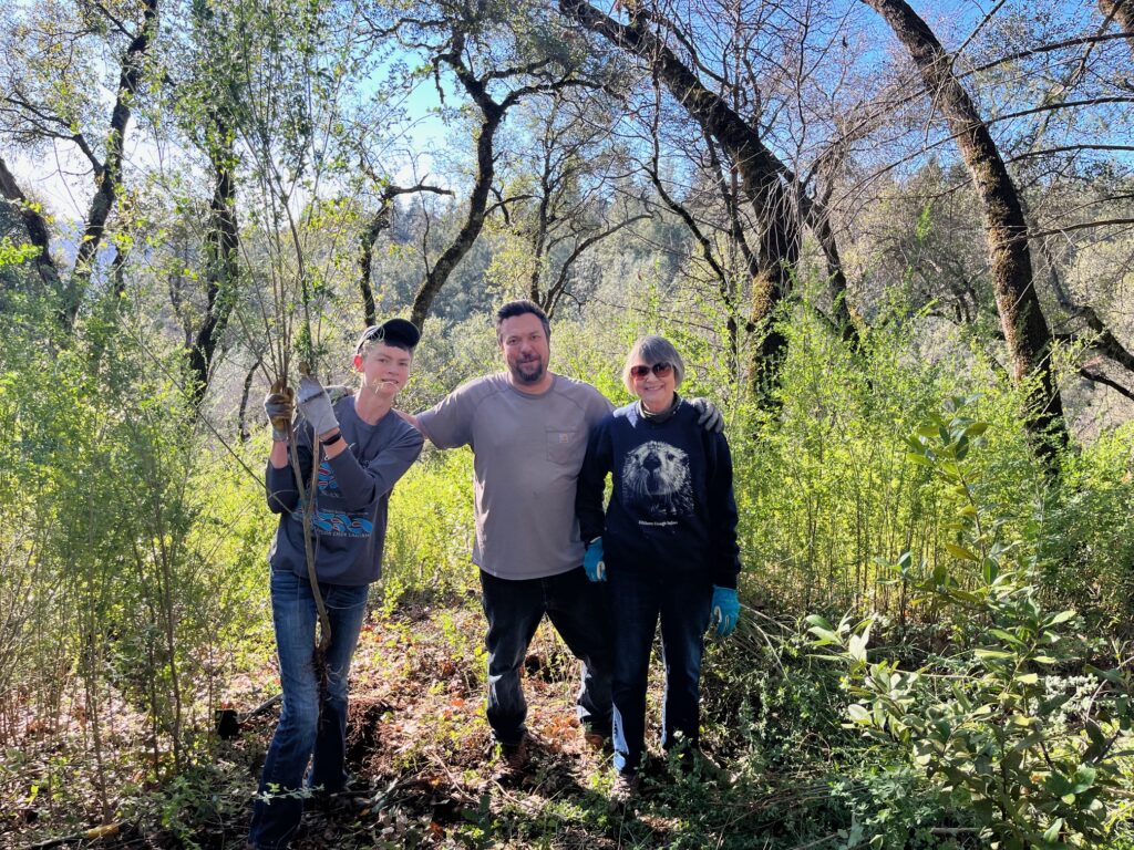 The Ferguson family takes a photo break in their broom patch