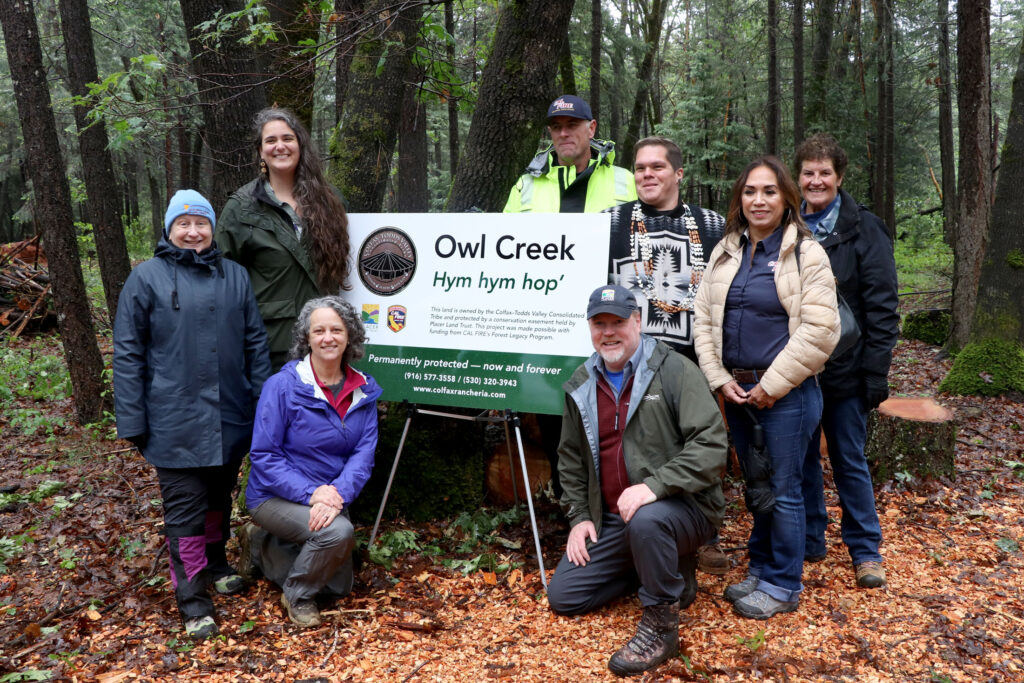 Project partners and supporters celebrate the completion of the Owl Creek project.