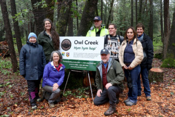 Project partners and supporters celebrate the completion of the Owl Creek project.